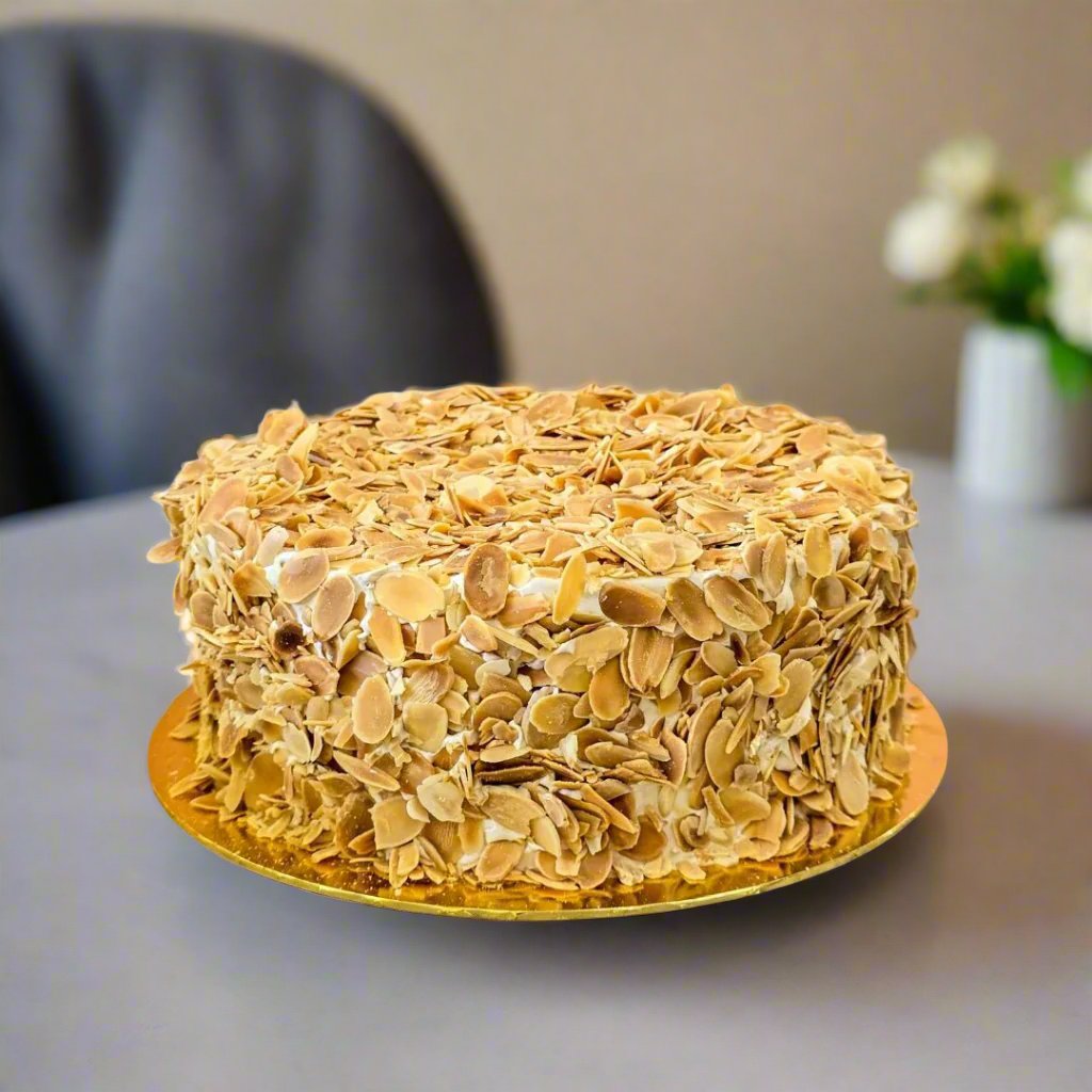 Gluten-free coffee cake with roasted almond bits and Nescafe Gold infusion.