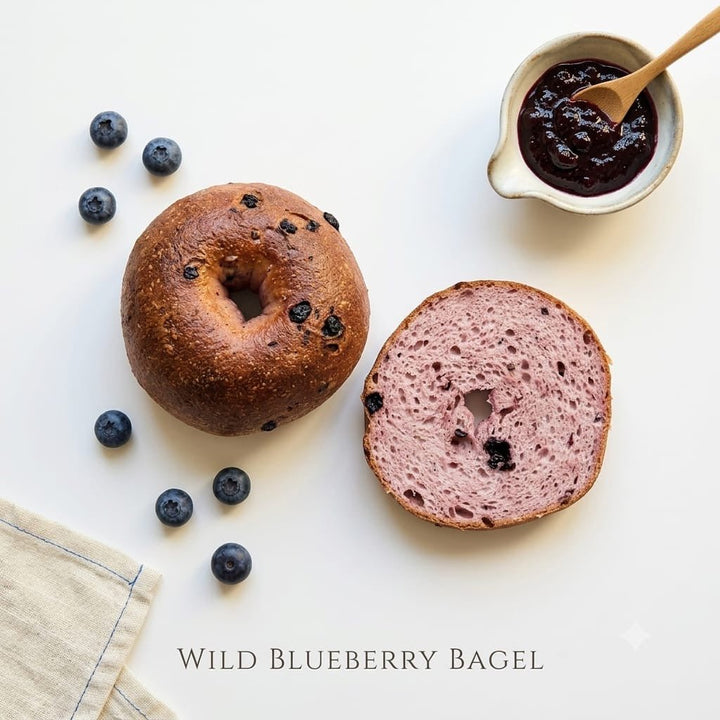 A bag of fresh Gluten-Free Blueberry Bagels showing vibrant purple berry swirls, artisan breakfast baking made by Penang local bakery SK Homemade Cakes.