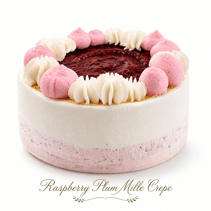 A Raspberry Plum Mille Crepe with delicate layers and raspberry topping by SK Homemade Cakes.